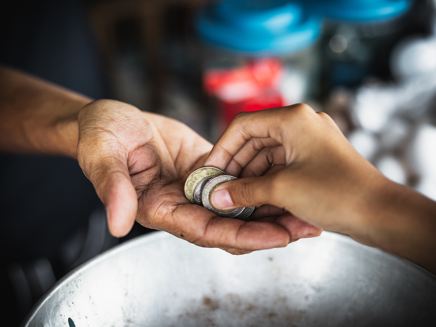 Hands Giving and Receiving Coins